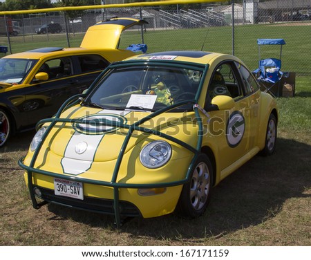 WAUPACA, WI - AUGUST 24:  Side of 2002 Green Bay Packers VW Beetle Car at Waupaca Rod and Classic Annual Car Show August 24, 2013 in Waupaca, Wisconsin.