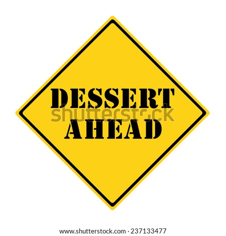 A yellow and black diamond shaped road sign with the words DESSERT AHEAD making a great concept.