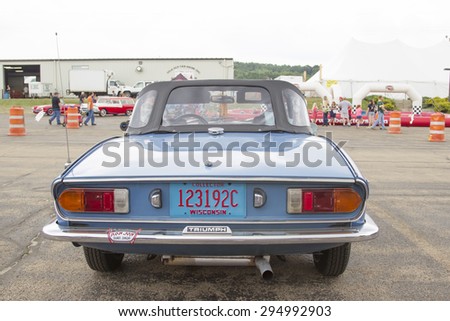 IOLA, WI - JULY 12:  Back of Blue Triumph Spitfire 1500 Car at Iola 42nd Annual Car Show July 12, 2014 in Iola, Wisconsin.
