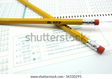 Two number 2 pencils and a bubble test sheet with instructions.
