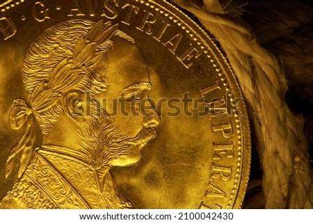 Austrian gold coin on a rope  Photo stock © 