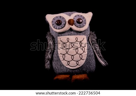 Handmade Statue of an Owl on Black Background