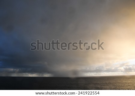 Stormy Dark Clouds over the Atlantic Ocean Water