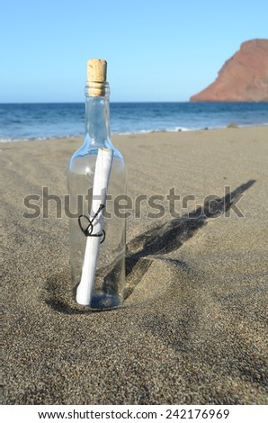 Message in a Bottle on the sand Beach