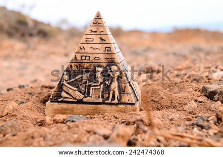 Egyptian Pyramid Model Miniature in the Rock Desert