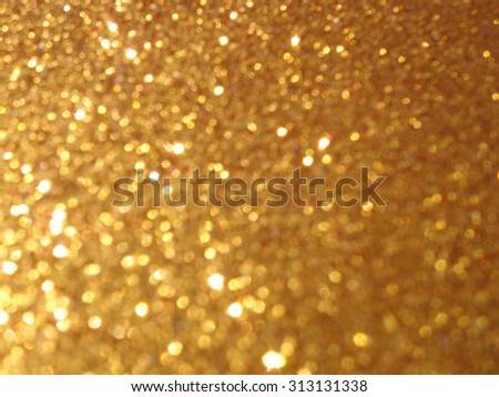 Christmas background. Gold Festive xmas bokeh background