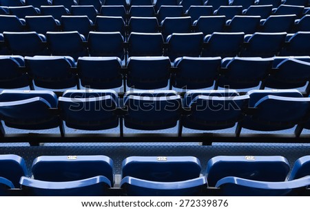 Blue stadium chairs in Thailand