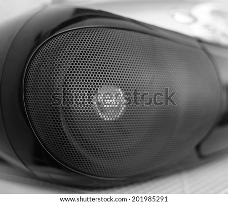 Closeup detail of high-tech cd player in black and white color