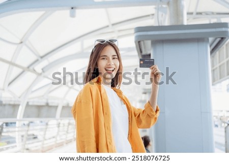 Similar – Image, Stock Photo Cheerful female traveler holding hand of boyfriend before leaving into trip