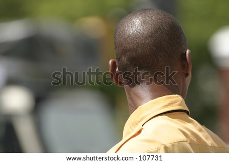 Back of man\'s shaved head