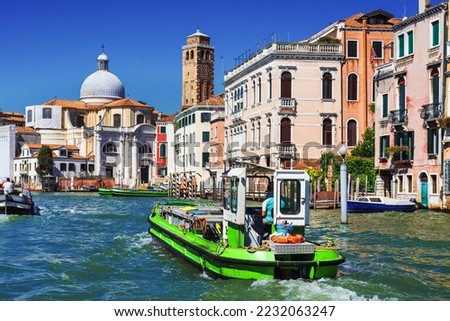 Similar – Image, Stock Photo Gondolas sailing along canal between city buildings