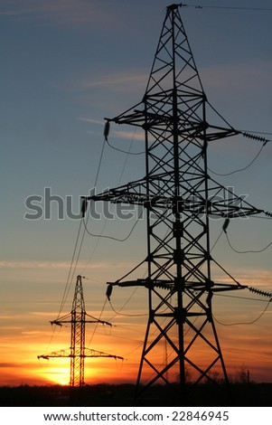 The electrical network against the backdrop of sunset
