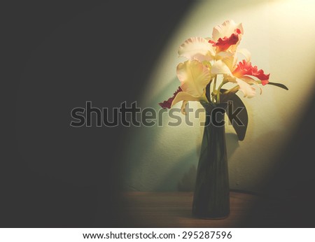 Vase of flowers in found objects style
