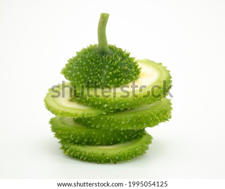 front  view, Spiny gourd or spine gourd also known as bristly balsma pear, prickly carolaho isolated on white background Photo stock © 