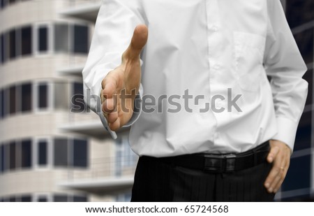 man with an open hand ready to seal a deal