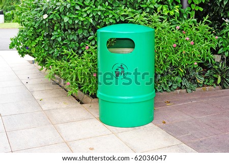 Green Plastic Waste Container In The Park