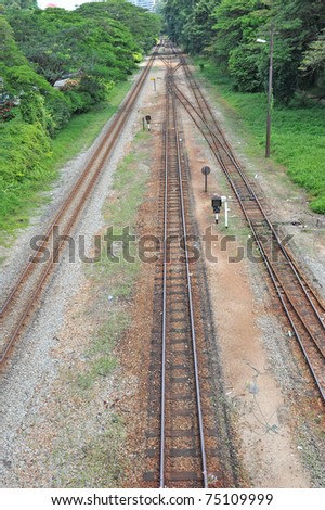 Three Railway Tracks Running Parallel To Each Other