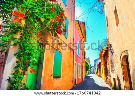 Colorful architecture with blooming flowers on the street in Valensole, Provence, France.  Stok fotoğraf © 