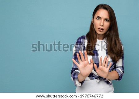 Similar – Image, Stock Photo A young woman says goodbye to an incredibly cuddly house cat. The cat enjoys the caresses in the sun on the stairs.
