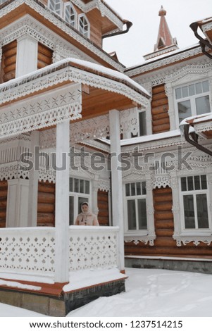 Bohemian girl and wooden house (