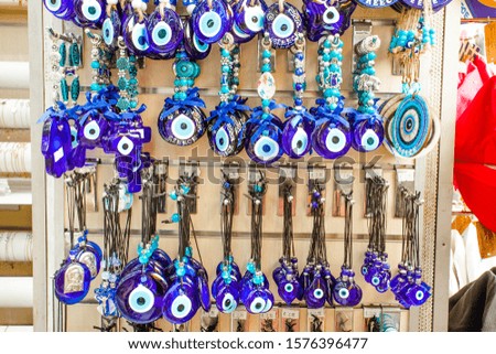 Evil eye bead protection amulet in the shop or market. One of the most popular souvenirs