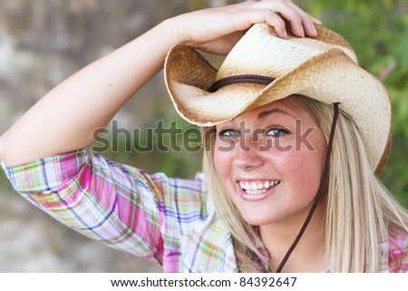 Cowgirl wearing a cowboy hat