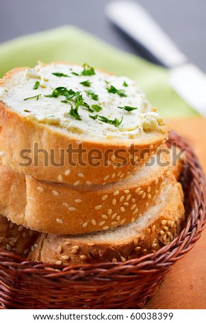 Sandwich with fresh soft cheese and herbs,shallow focus