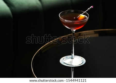 Similar – Image, Stock Photo Red cocktail with olive and lemon