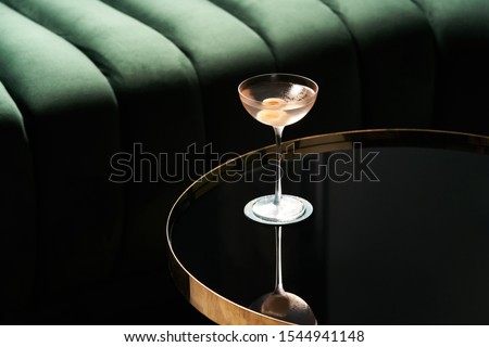 Similar – Image, Stock Photo Red cocktail with olive and lemon