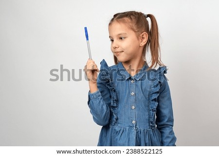 Similar – Image, Stock Photo girl holding pen writing book study learning digital internet video online computer laptop at home.