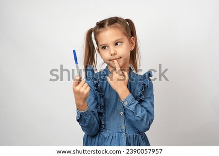 Similar – Image, Stock Photo girl holding pen writing book study learning digital internet video online computer laptop at home.