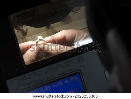 Similar – Image, Stock Photo Mature jeweler creating gold item using a pencil in workshop