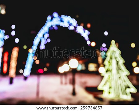 Winter night de-focus defocus blurred bokeh with New Year tree