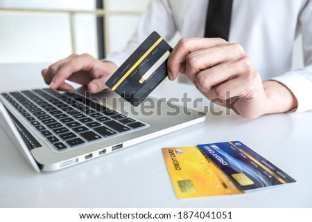 Man using credit card register security code payments online shopping and customer service network connection market, using technology on laptop, Internet Online shopping or banking concept.