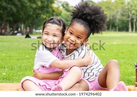 Similar – Image, Stock Photo Two little girls gardening in urban community garden