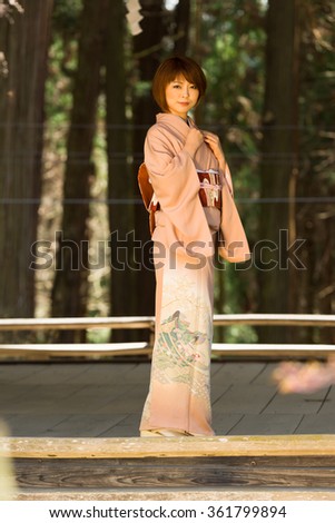 Woman and cherry blossoms of the Japanese kimono