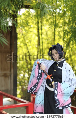 Japan anime cosplay portrait of girl with comic costume with japanese theme