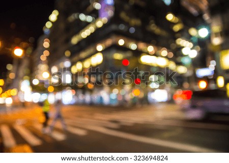 Defocused blur of New York City lights and street at night