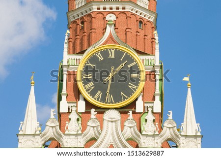 Сhiming clock of the Spasskaya Tower close-up on a sunny day. Moscow Kremlin, Russia