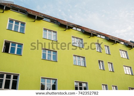 green industrial apartment building