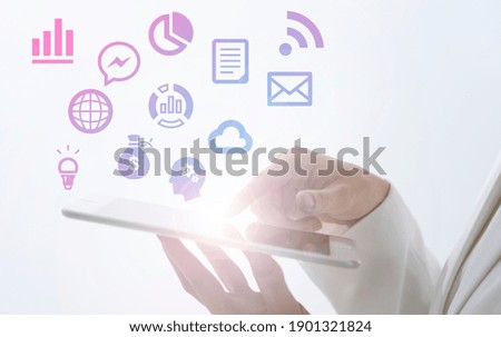 A woman operating a mobile device and icons representing various functions