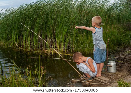 Similar – Image, Stock Photo child holding a fish and showing it to the camera