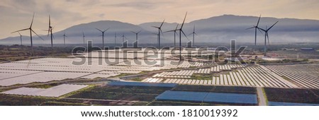 solar energy panels and wind turbine. Drone view BANNER, LONG FORMAT