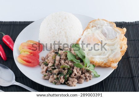 Thai spicy food, Spicy fried pork with basil and fried egg