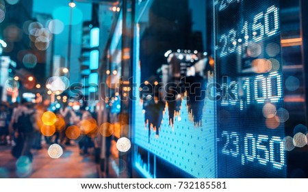 Display of Stock market quotes with city scene reflect on glass Stock foto © 