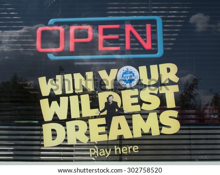 Andover Birinus Gardens, Hampshire, England - July 31, Euro Lottery advertising sign in Saxon Fields Stores shop window