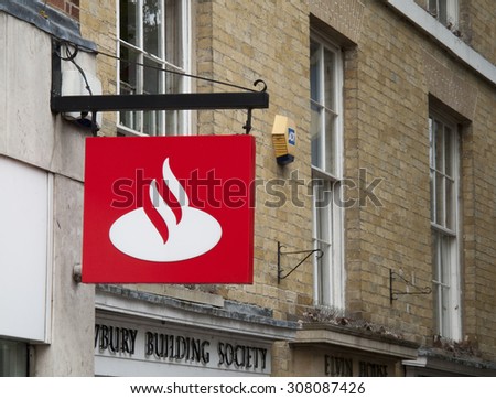 Andover, High Street, Hampshire, England - August 20, 2015: Santander UK plc bank sign over local branch entrance, owned by the Spanish Santander Group
