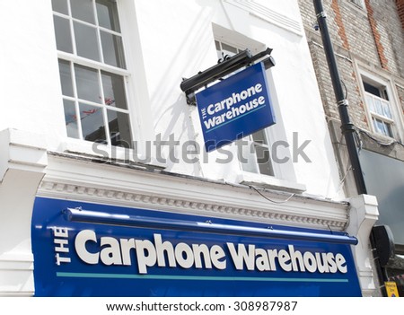Newbury, High Street, Berkshire, England - August 21, 2015: The Car Phone Warehouse sign over store, British mobile phone company with over 2,400 stores across Europe