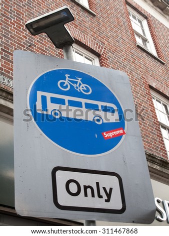 Winchester, Upper Brook Street, Hampshire, England - July 31, 2015: Bus and bicycle only road sign on the corner of Upper Brook Street and High Street