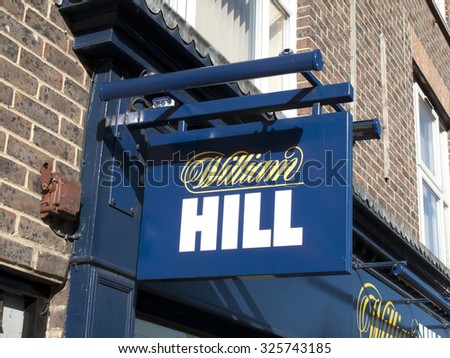 Newbury, Market Place, Berkshire, England - October 10, 2015: William Hill bookmakers, company founded by William Hill in 1934 at a time when gambling was illegal in Britain